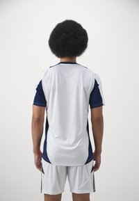 adidas Performance REAL MADRID 24/25  JERSEY - Sporto klubų atributika - white/team navy blue/crew orange