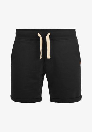 Schwarze Baumwollshorts mit einem gerippten Bund, cremefarbenen Kordeln und umgeschlagenen Säumen. Verfügt über ein kleines Logopatch an der Seite.