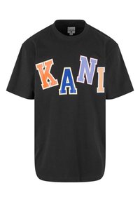 Black t-shirt featuring large multicolored letters spelling "KANI" in various shapes. Made of cotton with a relaxed fit.