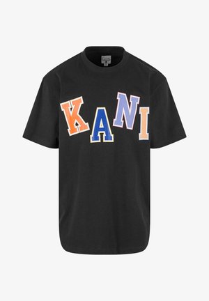 Black t-shirt featuring large multicolored letters spelling "KANI" in various shapes. Made of cotton with a relaxed fit.