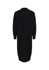 Overwymiarowa czarna dzianinowa sukienka z okrągłym dekoltem, opuszczonymi ramionami i długimi rękawami. Gładka tekstura z prostą sylwetką do dołu.