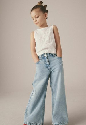 Next, WIDE LEG JEANS.  - REGULAR FIT - Relaxed fit jeans - light blue