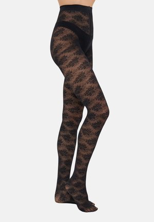 Zwarte panty met een bloemenpatroon, hoge taille en doorschijnende textuur; naadloze overgang naar het voetgebied.