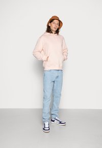 Weekday STANDARD HOODIE - Sweatshirt com capuz - light pink