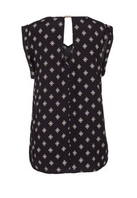 Blusa nera con motivi a diamante bianchi, maniche corte e apertura a chiave sul retro chiusa da una perlina color oro. Tessuto morbido.