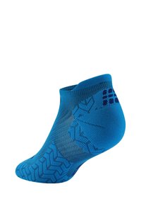 Blaue Knöchelsocke mit einem strukturierten Muster, das Zickzack-Designs aufweist, einer engen Passform und kontrastierenden dunkleren blauen Akzenten.