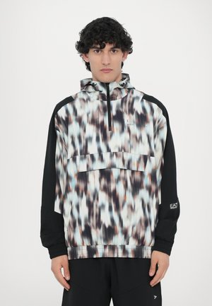 Colorful hoodie with a blend of blue, brown, and black patterns; features a half-zip, hood, and elastic cuffs with branding on sleeve.