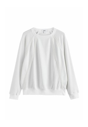 Hvid langærmet sweatshirt med ribmanchetter, strukturerede raglanærmer og paneldetaljer foran og rundt om halsudskæringen.