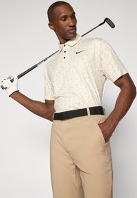 Nike Golf TOUR PRINT - Polotričko - pale ivory/black