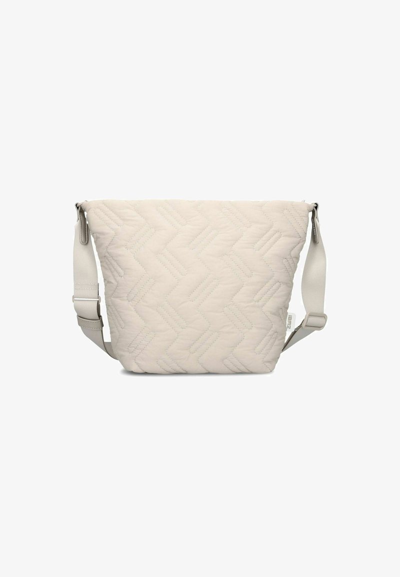 Borsa a spalla trapuntata in beige chiaro, caratterizzata da un motivo geometrico, tracolla regolabile e una texture liscia. Chiusura con zip nella parte superiore.
