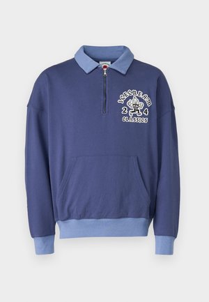 Sudadera de color azul marino con cremallera de un cuarto, cuello azul claro, bolsillo delantero y diseño bordado "ICECREAM 244 CLASSICS".