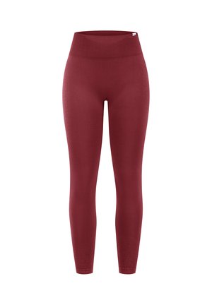 Højtaljede, hel-længde sømløse leggings i dyb rød med ribbet taljebånd og lille logomærke tæt på taljen.