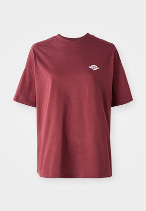 Maroon cotton t-shirt with a crew neckline, short sleeves, and a small white logo on the left chest area. Smooth texture, relaxed fit.
