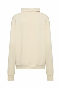 Kremowy sweatshirt z podwiniętym kołnierzem, długimi rękawami i luźnym krojem, wykonany z miękkiego materiału o gładkiej fakturze.