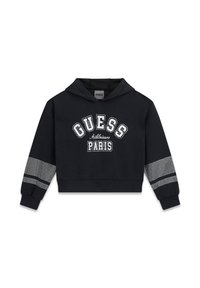 Sweat à capuche noir court en coton. Présente un texte graphique blanc « GUESS Athleisure PARIS » avec des accents en strass et des manches à motifs.