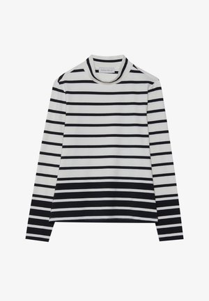 Majica z dolgimi rokavi iz bombaža, s horizontalnimi črnimi in belimi črtami, visokim ovratnikom in sproščenim krojem s stranskimi razpoki.