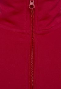 Red zip-up hoodie featuring a ribbed texture, metal zipper, and a high collar. The fabric appears soft and stretchy.