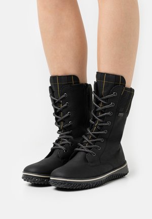 Rieker Winter boots - schwarz/gold
