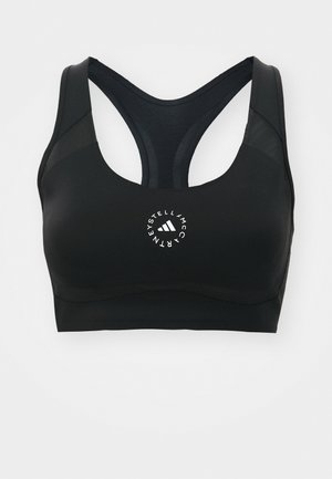 Czarny stanik sportowy z plecakiem, wykonany z gładkiego materiału. Posiada biały okrągły logo na środku oraz siateczkowe akcenty.