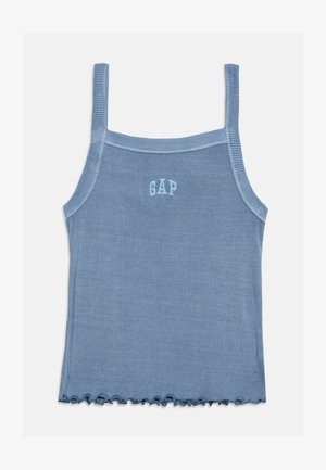 Débardeur côtelé bleu avec fines bretelles, logo « GAP » sur la poitrine, et détail à volants en bas.