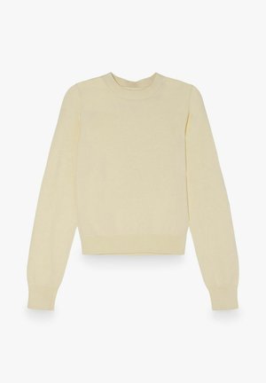 Krémový pletený sveter s dlhým rukávom, rebrovaným okrúhlym výstrihom, manžetami a lemom, položený na bielom pozadí.