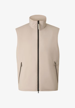 Veste sans manches beige avec col montant, fermeture éclair noire à l'avant et deux poches latérales zippées.