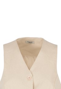 Gilet beige senza maniche con scollatura a V e una singola chiusura con bottone di colore chiaro. Tessuto morbido e strutturato, interno foderato per maggiore comfort.