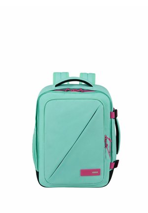 Zaino rettangolare verde menta con cursori delle cerniere rosa, cucitura frontale diagonale, spallacci imbottiti e maniglie laterali.