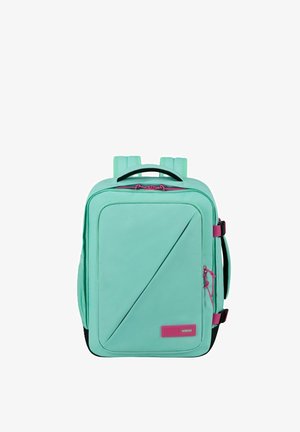 Zaino rettangolare verde menta con cursori delle cerniere rosa, cucitura frontale diagonale, spallacci imbottiti e maniglie laterali.