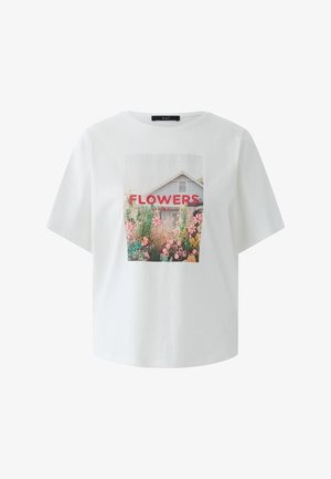 White short-sleeve t-shirt with a graphic of a house, flowers, and the word "FLOWERS" in red letters across the chest.