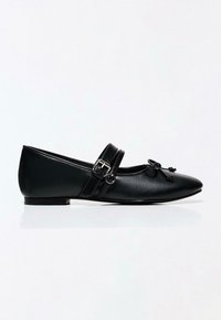 Black leather flat shoe with pointed toe, decorative bow, and adjustable double buckle straps across the top.