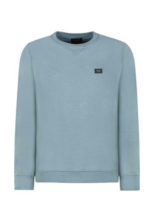 Lichtblauwe sweatshirt gemaakt van zachte stof, met een ronde hals, lange mouwen en een klein zwart label op de borst.