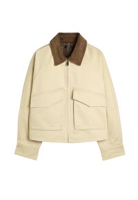 Beżowa kurtka z brązowym kołnierzem z sztruksu, z zamkiem błyskawicznym, dwoma dużymi przednimi kieszeniami i luźnym krojem. Wykonana z trwałego materiału o gładkiej fakturze.