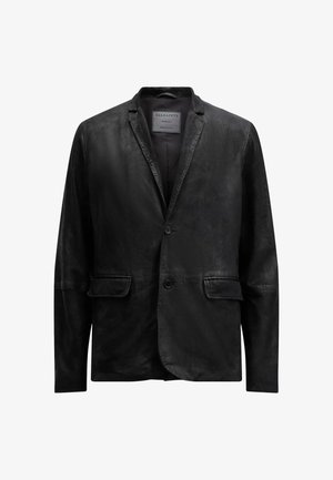 Musta nahkatakki, jossa on teksturoitu pinta, yksirivinen, kaksi etutaskua, lovikaulus ja kaksinappikiinnitys.