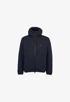 Giubbotto imbottito blu navy con colletto alto e zip frontale. Presenta polsini elasticizzati, una tasca sul petto e un rivestimento interno a contrasto.