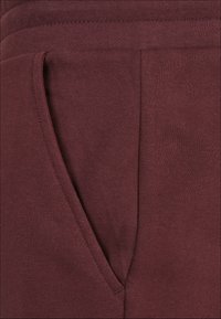 Urban Classics Pantaloni cargo - cherry
