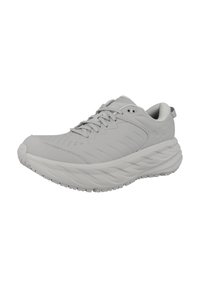 Svetle šedé sportovní boty s texturovaným povrchem, kulatou špičkou, šněrovacím designem a silnou, tvarovanou podrážkou s vlnkovaným vzorem.