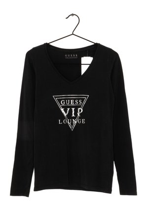 Zwart langarmig V-hals shirt aan een hanger met witte tekst "GUESS VIP LOUNGE" binnen een driehoekig logo aan de voorkant.
