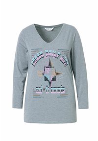 Grijze, lang mouw V-hals T-shirt met een grafische print van een tijgerkop en tekst. Zacht katoenen materiaal met een comfortabele pasvorm.