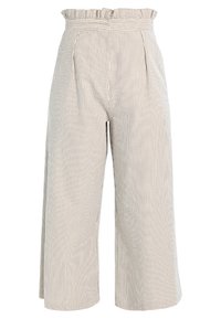 Light beige wide-leg trousers with vertical dark stripes, featuring a ruffled waistband, pleats, and a soft, textured fabric.