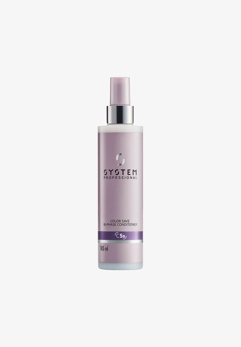 Bi-phase conditioner in a translucent lavender bottle. Features silver hardware and a purple label, with 185 ml capacity.