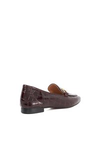 Burgundy leather slip-on loafers with crocodile texture, featuring a gold-tone hardware accent and a low black heel.