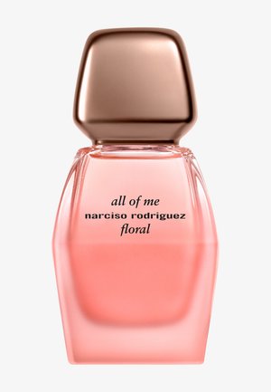 Rosa Glasparfümflasche mit einer kantigen Form und einem runden Kupferdeckel. Auf dem Etikett steht "all of me narciso rodriguez floral."