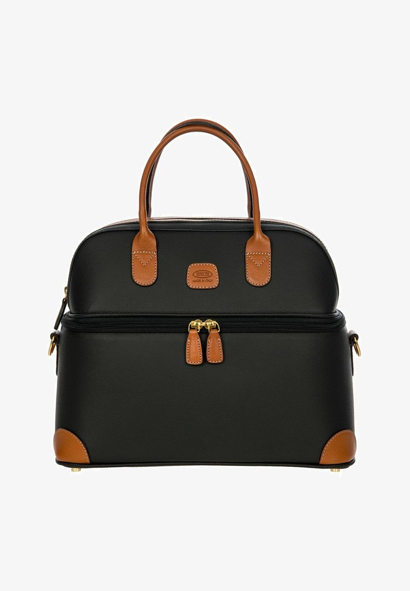 Bolso de mano de cuero negro con acentos de cuero marrón claro, forma redondeada, cierre de doble cremallera y pies de protección en la base.