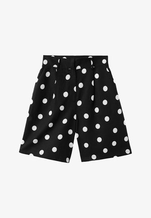 Zwarte korte broek met wijde pijpen en witte stippen, voorzien van ceintuurlussen en zijzakken, plat gelegd op een witte achtergrond.