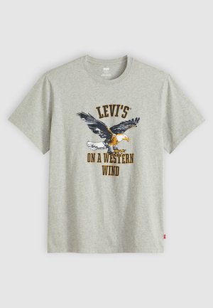 Light gray Levi's t-shirt with a graphic of a flying eagle and the text "LEVI'S ON A WESTERN WIND" in orange and black.