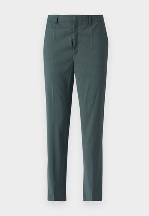 Pantalon ajusté en tissu bleu sarcelle, avec une taille plate, coupe slim, passants de ceinture et une texture lisse. Pas de poches visibles.