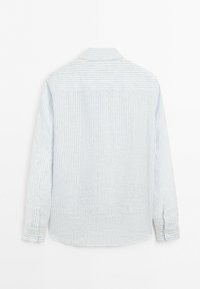 Long-sleeved, light blue and white vertically striped button-up shirt viewed from the back, collar and cuffs visible, no people shown.