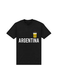 Sort bomulds t-shirt med hvid "ARGENTINA" tekst, et gult og hvidt våbenskjold med to stjerner og en rundhals design.