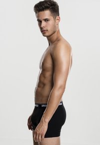 Urban Classics Široké boxerky - black